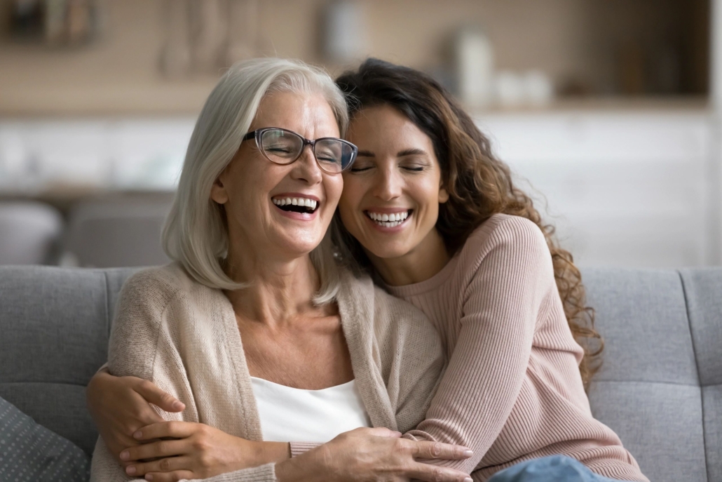 Daughter hugging her elderly mother diagnosed with one of the types of dementia