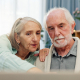 A couple at home together, reflecting the gentle support of early stage dementia care